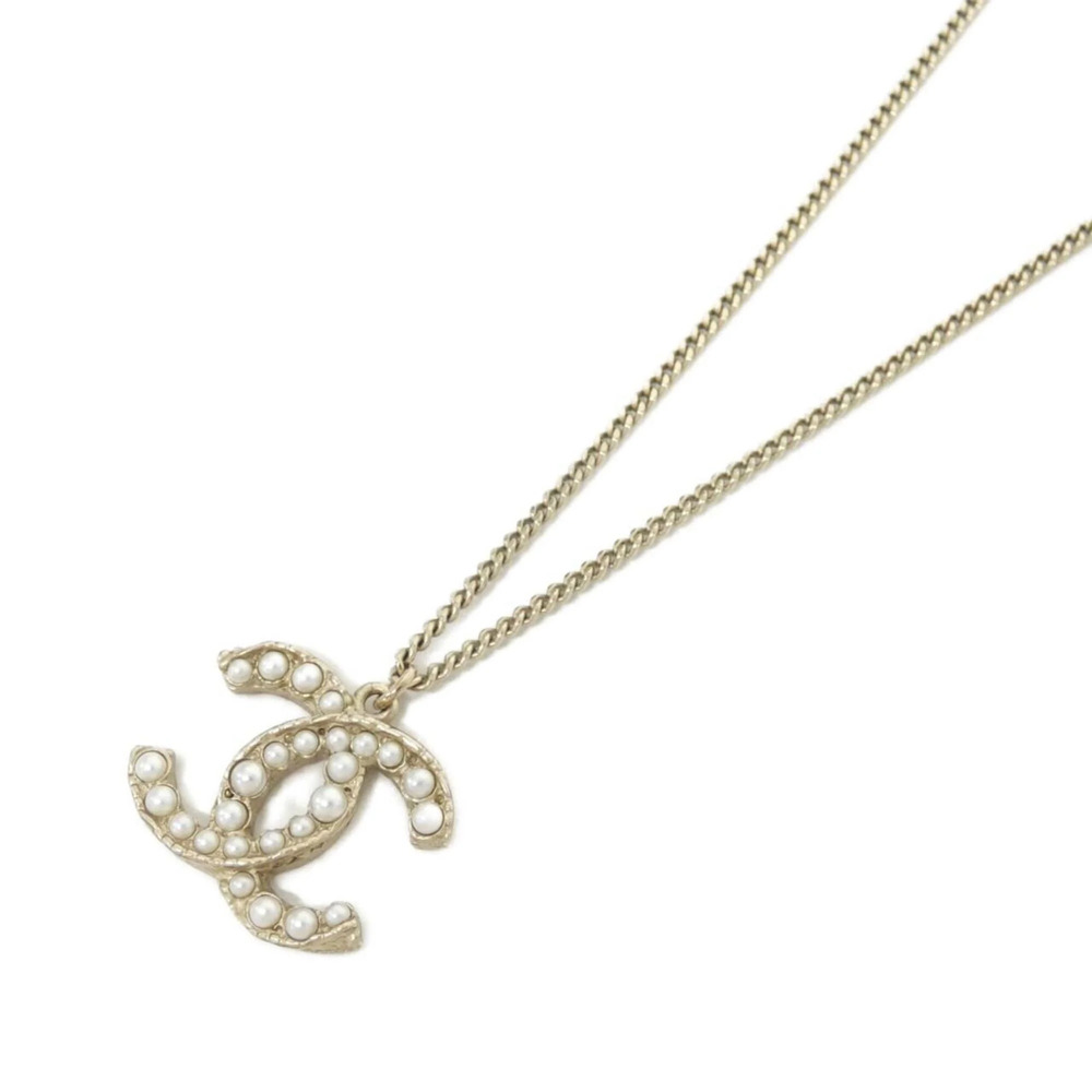 CHANEL White Necklace